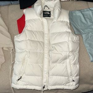 white north face puffer vest